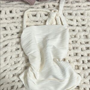 womans cream color halter top